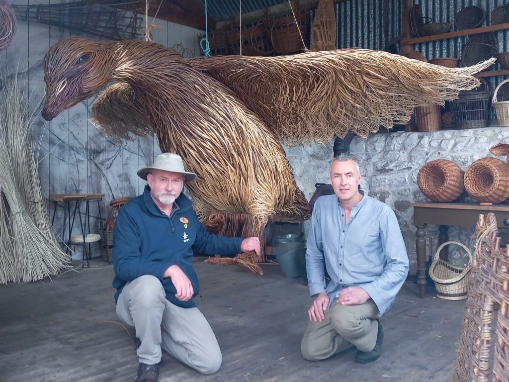 Centre Manager Paul Stewart and willow sculpture maker Bob Johnston with the 'Spirit of Strangford Lough' sculpture